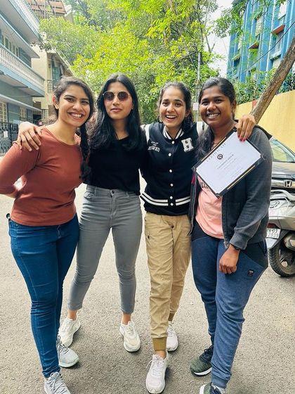 A group of friends proudly display their certificates. They are no longer passengers in their own lives; they are riders.