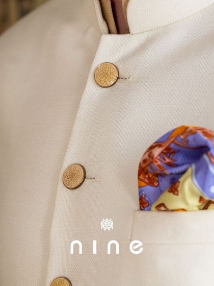 Attention to detail is everything. The fine fabric of the jacket, the custom buttons, and the colorful pocket square mirror the quality we put into our gift items.