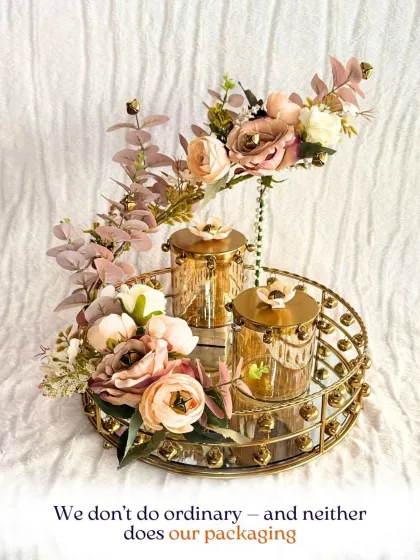 I don't do ordinary, and neither does my packaging. This stunning gold-toned hamper with a mirrored tray and ornate jars is a testament to my commitment to luxury.