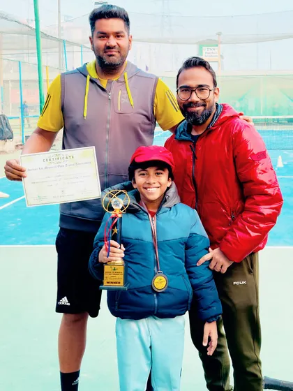 Aariv Gupta gave a splendid performance at the Darbari Lal Memorial Open, winning the Under-12 boys title without dropping a single game. He is seen here with his coaches, trophy, and certificate.