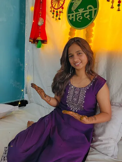 Showing off my own mehendi, a simpler design perfect for the occasion.
