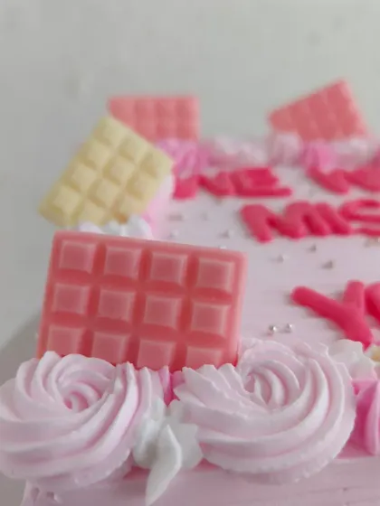 A close-up of the farewell cake's decorations.