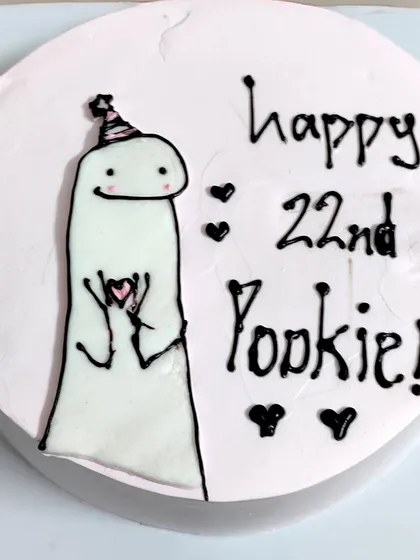 The pookie in your life deserves this cake! 🤌🏻🩷 A minimalist and trendy cake featuring a cute meme character, perfect for your Gen-Z partner or friend.