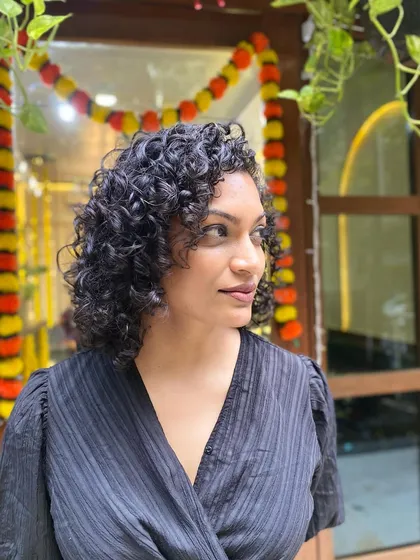 More examples of my short curly haircuts, from bobs to layered chops, each one personalized to the client's curl pattern and face shape.