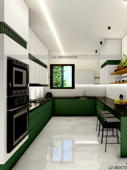 The same kitchen design from a different angle, showing the U-shaped layout and an integrated breakfast bar for casual dining. The built-in tower unit houses the oven and microwave.