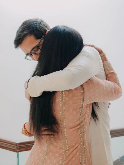 A warm, heartfelt embrace that says everything without a word. This photo captures the comfort and security two people find in each other, a simple and powerful expression of love.