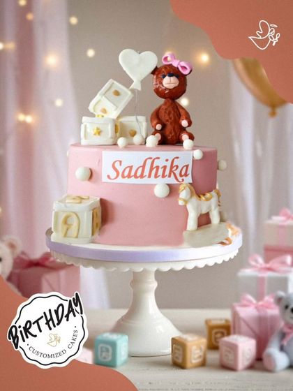 A sweet and playful cake for a toddler's birthday, featuring a teddy bear, a rocking horse, and building blocks in soft pastel colors.