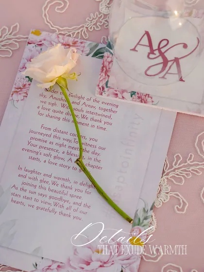 Details that exude warmth. A personal note to guests, paired with a single rose on a beautifully designed menu, creates a feeling of intimacy and gratitude.