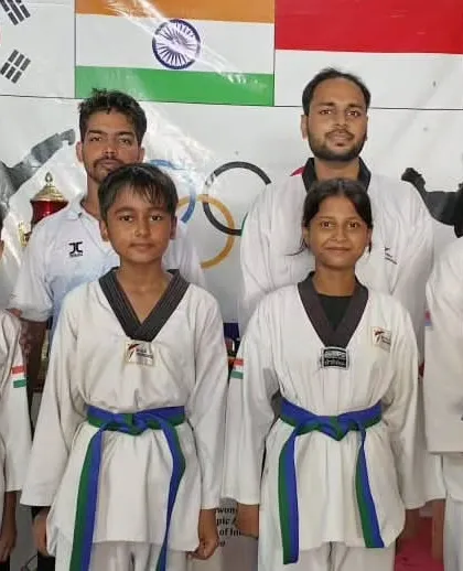 Our blue belt students, who are developing the skills needed for competitive Taekwondo.