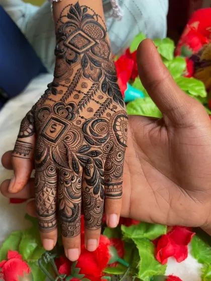 A sweet photo showing the bride's hand with her partner's, a lovely way to capture the moment.
