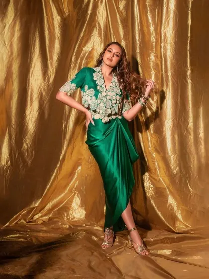 For the promotions of Netflix's 'Heeramandi', I was on the team that styled Sonakshi Sinha. This emerald green Anamika Khanna ensemble, with its intricate embroidery and modern draped silhouette, was chosen to reflect the grandeur and elegance of the series.