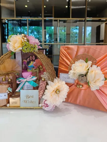 The complete wedding gift set, featuring the golden wire basket hamper and a matching satin-wrapped gift box. A truly elegant and cohesive presentation.