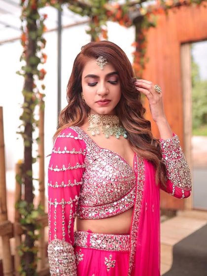 A final shot of the engagement look, capturing the bride's beauty and the artistry of the makeup.