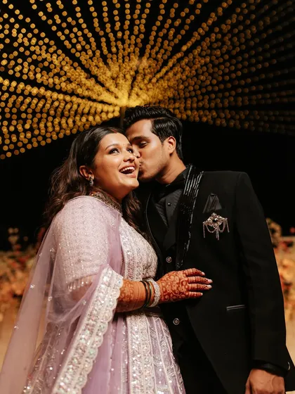 A romantic couple portrait from the reception, with beautiful lighting.
