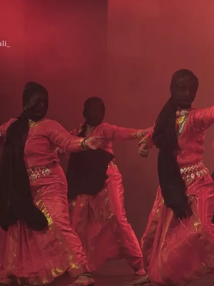 A powerful group formation from the 'Shakti' production. The dramatic lighting and synchronized poses highlight the storytelling and emotional depth of my choreographed stage shows.