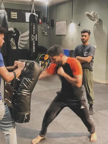 Power generation is key. This student is learning to drive through the pad, using his entire body to deliver a devastating punch.