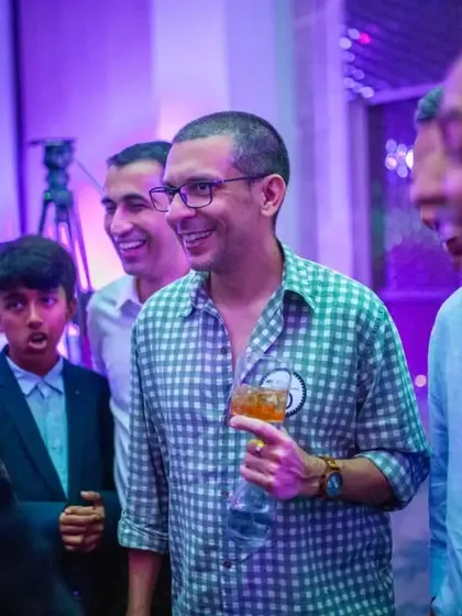 The joy and surprise on a guest's face during a close-up performance at a corporate offsite. Even in a large event, I make time for personal interactions.