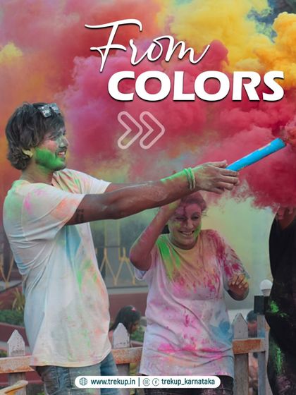 The joy of Holi. A participant throws colored powder in the air during our special event in Dandeli.