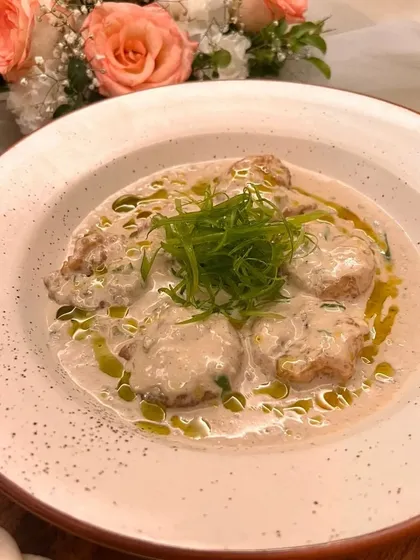 Taste the coast with our Green Chili Malai Prawns. We use succulent prawns from the Andamans, braised in a rich butter cream sauce with a kick of green chili, perfect for those who love creamy and spicy seafood.