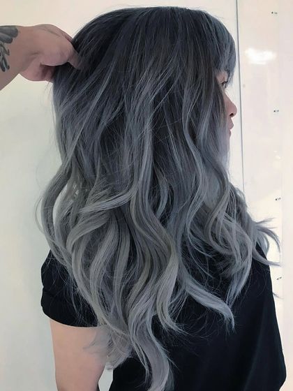 A dramatic and beautiful ash grey look. The color is bold and uniform, creating a striking and high-fashion statement.