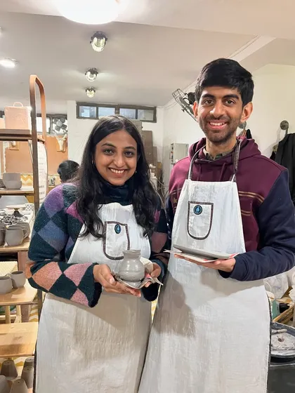 A perfect creative date. This couple is proudly showing off the first pieces they made during a beginner pottery session at our Nehru Place studio.