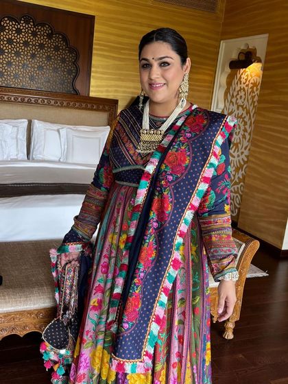 The full look, showing how the client is ready to twirl and dance with her hair securely and stylishly braided.