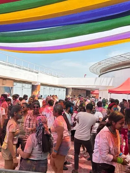 I’m comfortable playing for any crowd, big or small. This shot is from a massive Holi festival, where I managed the energy of a huge, vibrant audience under the open sky.