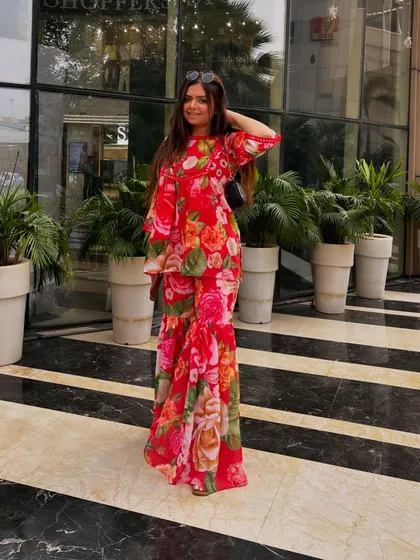 A happy, sunny day in my favorite floral outfit. This is the kind of content that feels joyful and full of life.