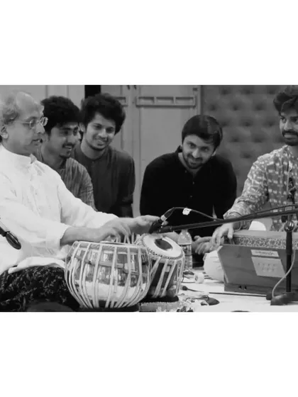A cherished photograph with my Guruji, Pt. Yogesh Samsi ji, and my gurubhais. Learning together as part of a musical family is a true blessing.