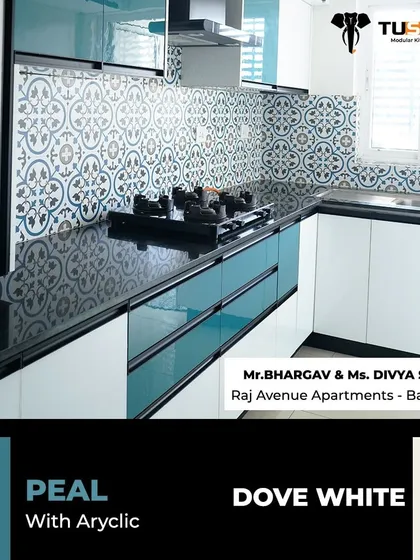 A closer look at the acrylic finish in Peal and Dove White for Mr. Bhargav's kitchen. The patterned backsplash adds a personal touch, showing how we can mix modern cabinets with classic design elements for a truly unique space.