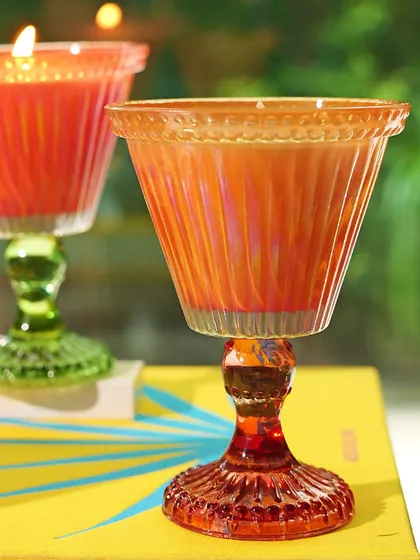 A playful ode to nostalgia, the Sundae Collection is crafted in vintage-inspired sundae glasses. This season, Sundae Pop arrives in four vibrant hues, each paired with an exclusive fragrance like Salted Vanilla or Sparkling Orchard.