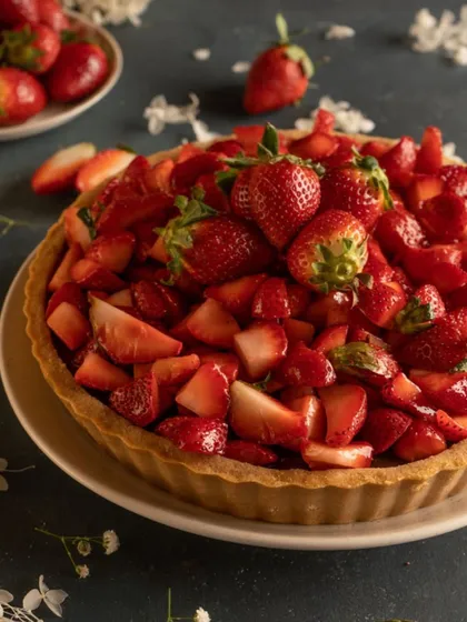 A classic for a reason. My Signature Chocolate Strawberry Tart features a buttery crust, rich chocolate pudding, and a generous topping of fresh, juicy strawberries.