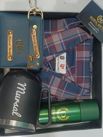 A thoughtful gift set with a Louis Philippe checkered shirt, a personalized mug, a custom wallet and keychain, and deodorant.