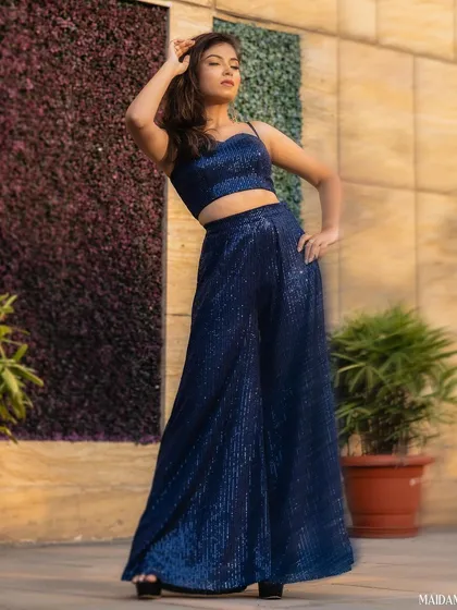 Ready for a night out, this sparkling blue sequin co-ord set is all about fun and glamour. I love creating pieces that let you shine, whether it's a traditional ceremony or a modern party.