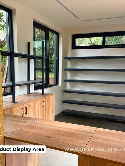 A duplicate of 92, this image details the custom shelving and counter space designed for the TATA COFFEE retail environment.