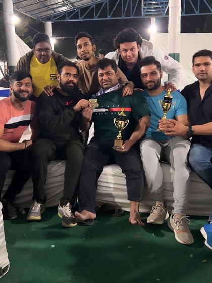 Holding the trophies with my team. These moments are what we train for.