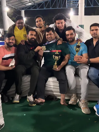 Holding the trophies with my team. These moments are what we train for.