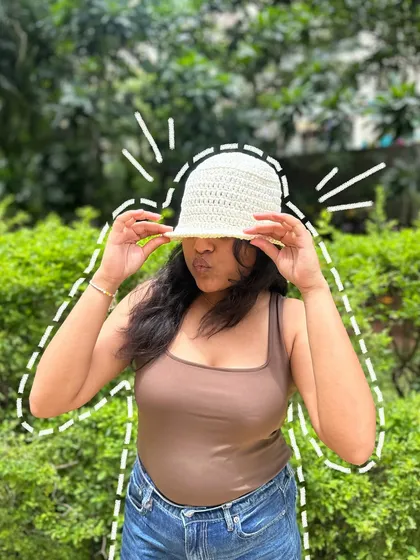 Our handmade crochet bucket hat is the perfect accessory for sunny days. It's lightweight, easy to pack, and can be customized in your favorite color.
