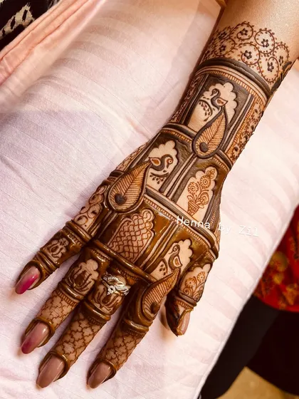 A detailed shot of a traditional design, showing the intricate patterns and shading on the back of the hand.