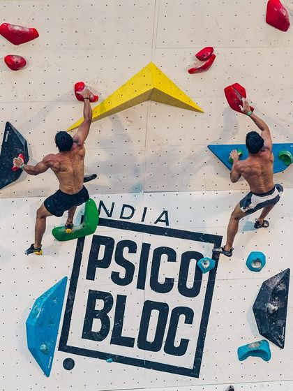 A perfect view of the head to head Psico Battle format. Two climbers race on identical routes, making for an exciting spectator sport.