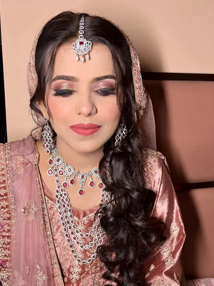 A close-up of the eye makeup. The blend of shimmer and matte shadows creates a beautiful, multi-dimensional look perfect for an evening reception.