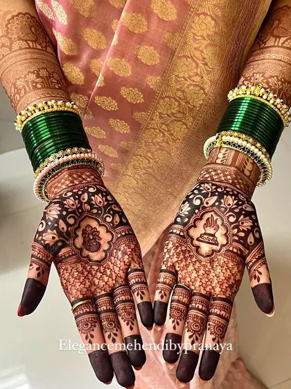 The proof is in the stain. I use my own blend of fresh, organic henna paste to ensure a deep, rich, and long-lasting color, just like this beautiful dark maroon stain on one of my brides.