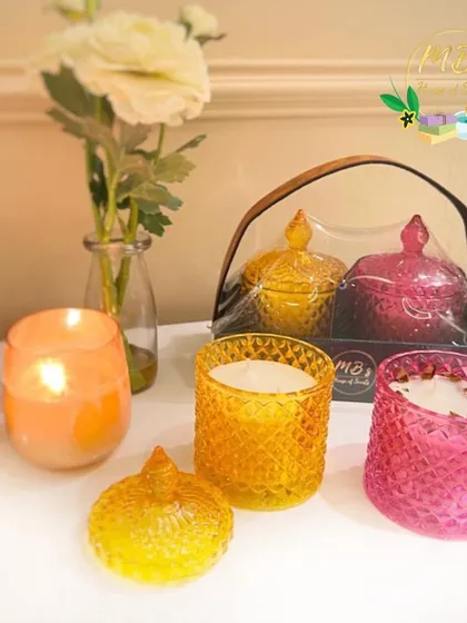 Here you can see the crystal jar candles unboxed, showing how they can be used as beautiful decor items. The textured glass catches the light beautifully, even when the candle isn't lit.