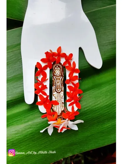 A clear, centered shot of the Mataji henna figure, showing the full detail of the drawing. This is a sample of the kind of devotional portraits I can create for religious festivals.