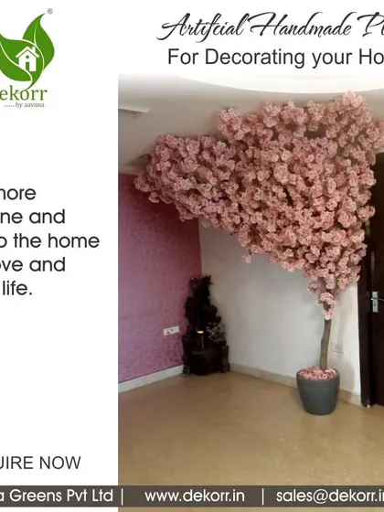 Add more sunshine and love to your home with our artificial handmade plants. This pink flowering tree brings life and color to this living room corner.