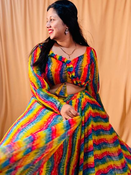 The happy smile of a client wearing my popular carnival lehenga. It’s an outfit that brings instant joy and is perfect for festive occasions.