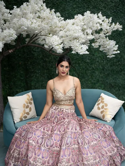 This shot captures the essence of a dreamy, festive look. The makeup was designed to be soft yet glamorous, with a focus on radiant skin and eyes that sparkle, complementing the beautiful ethnic wear.
