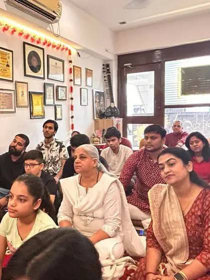 An attentive audience of students during a workshop. Learning also happens through deep listening and observation.