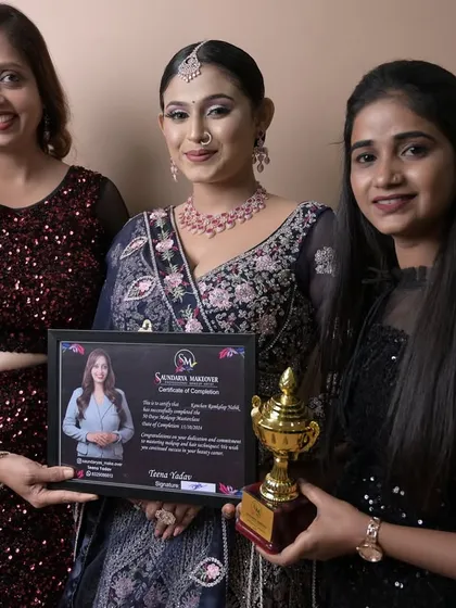 Certification day is a huge milestone. Here I am presenting a student with her diploma and a trophy for her excellent work.
