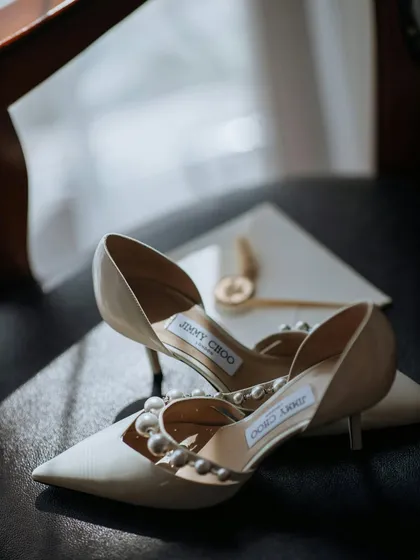 The details matter. A close-up of the bride's Jimmy Choo shoes, a small but significant part of her story that I make sure to immortalize.